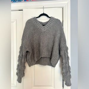 Elan, grey knit sweater, fits a small.